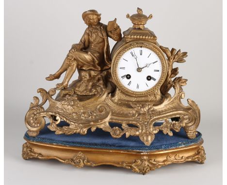 Antique French composition metal mantel clock on a wood-carved console.&nbsp;Circa 1860. Eight-day movement, half-hourly stri