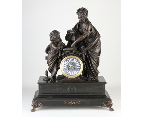 Large 19th century French black marble mantel clock with woman, book and child.&nbsp;Composition metal.&nbsp;Circa 1860. Crac