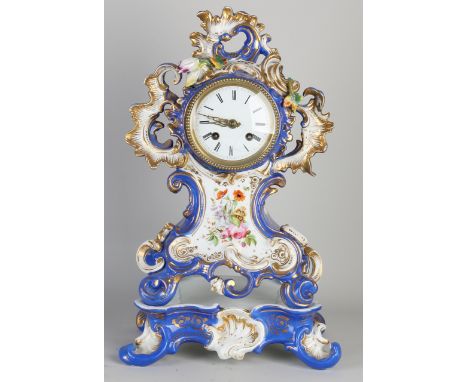 Antique French porcelain Charles Dix Cartel table clock with console.&nbsp;blind mark.&nbsp;Circa 1840. With floral gold deco