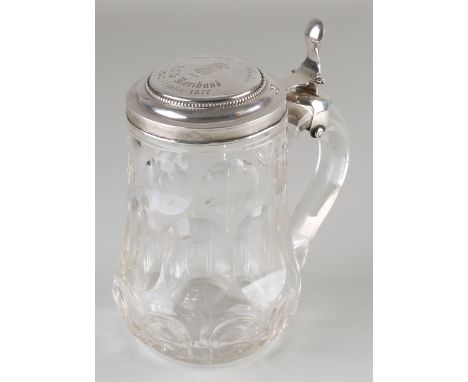 Crystal beer mug decorated with round and oval cuts, fitted with a silver lid, 833/000, with thumb stop and pearl rim.&nbsp;T