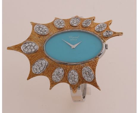 Unique gold Chopard watch, 750/000, Mechanical, with a white gold hinged strap.&nbsp;Fitted with a white gold oval case with 