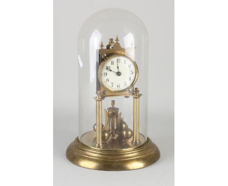Antique brass year mantel clock under a glass dome.&nbsp;marked.&nbsp;Circa 1900. Functions not tested.&nbsp;Dimensions: H 31