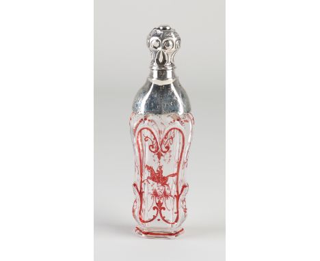 Odeur bottle with a silver collar and cap, 833/000.&nbsp;Contoured crystal flask with red decoration with a figure on a horse