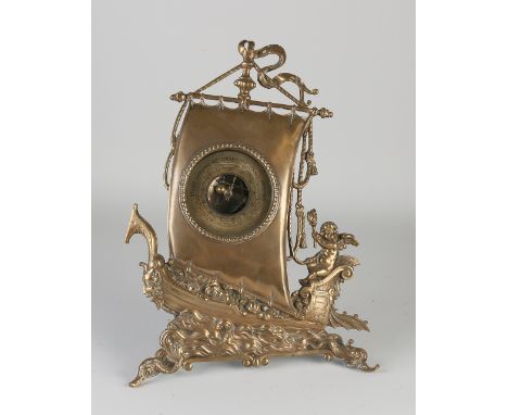 Antique Dutch desk barometer made of brass.&nbsp;Amor on ship.&nbsp;Circa 1920. Size: 32 cm.&nbsp;In good condition.