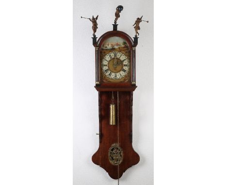 19th century oak Frisian tail clock with alarm clock and wooden statues.&nbsp;Dimensions: 144 cm.&nbsp;In good condition.
