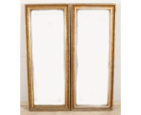 Two large 19th century gilded empire mirrors.&nbsp;Light signs of use.&nbsp;Dimensions: H 146 x W 58 cm.&nbsp;In good conditi