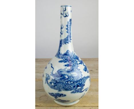 CHINESE 'DRAGON', blue and white bottle vase, the dragon chasing the flaming pearl of wisdom, 30cm H. 