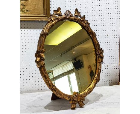 EASEL MIRROR, 53cm H x 40cm, late 19th/early 20th century giltwood with later yellow tinted plate. 