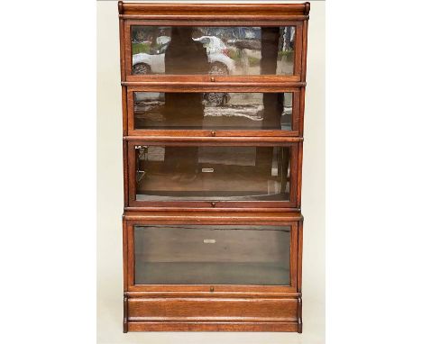 GLOBE WERNICKE BOOKCASE, late 19th/early 20th century oak with four glazed stacking units, plinth and cornice, 87cm x 35cm x 