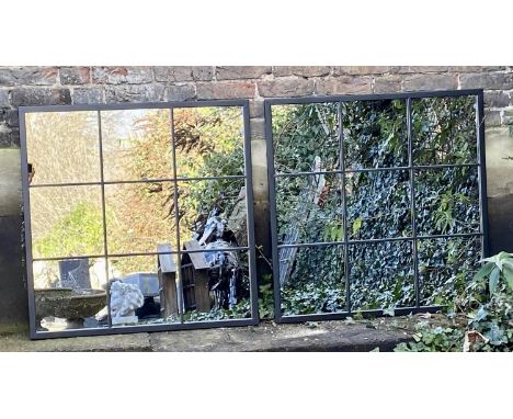 ARCHITECTURAL GARDEN MIRRORS, a pair, black metal frames, 90cm x 99cm. 