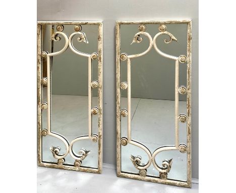 ARCHITECTURAL WALL MIRRORS, a pair, aged metal frames, Italian style design, 112cm x 48cm. 