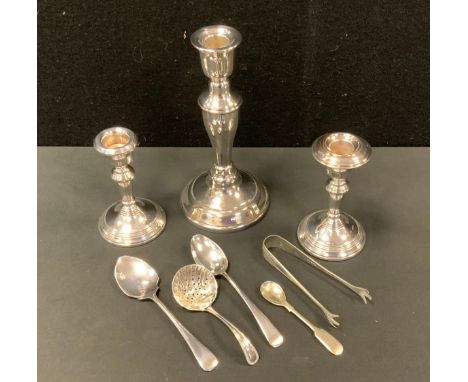 A pair of silver boudoir candlesticks, 11cm high, Birmingham plated preserve spoon, sugar bows;  tongs; plated candlestick;  