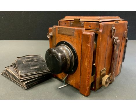 An Ensign Special Reflex Camera, tropical model, with seven plate holders 