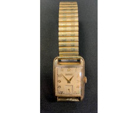A Rotary 9ct gold tank wristwatch, textured dial, Arabic numerals, subsidiary seconds, manual wind A52 830 movement, 9ct gold