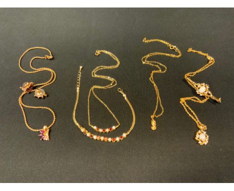 A gold plated garnet and CZ necklace and bracelet;  gold plated necklace;  opal pendant and bar brooch;  etc 