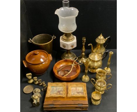 A brass and ceramic oil lamp;  brass tea and coffee ware;  ice bucket;  oak music stand;  'Golly' money box;  graduated weigh