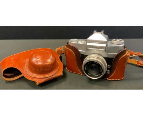 A Wray Wrayflex SLR Camera,  chrome, serial no. 3972, with Unilux f/2.8 50mm lens, leather case, c.1960 