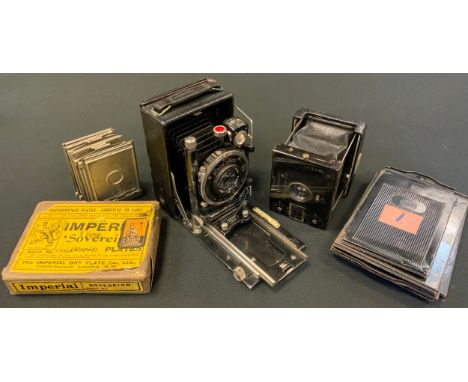A Vest Pocket Tenax camera, C P  Goerz Berlin, 2 X 1 1/2 plates, with 7 plate slides, c.1920;   a Zeiss Ikon 3 x 2 plate came