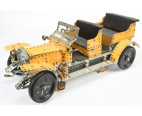 Meccano. Model of a Rolls Royce Silver Ghost. Constructed using yellow, black &amp; silver parts, fitted with manual steering