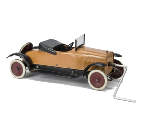 A Structo No 12 Automobile Deluxe,  repainted orange steel, crank handle keywind mechanism with gears, windshield, dummy hood