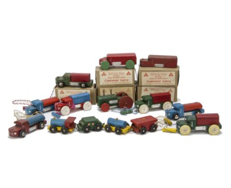 Tri-ang Miniature Pull-A-Long Toys, three Container Lorries --4in. (10cm.) long, Delivery Van and Tank Lorry, in original box