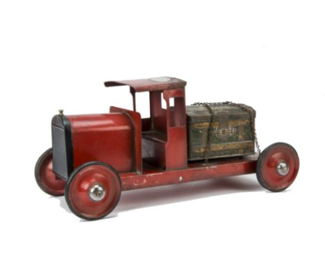 ANNOUNCE - TWO OF THIS VEHICLES TYRES HAD BECOME VERY BRITTLE AND ARE NOW IN PIECESAn unusual Tri-ang steel Lorry Biscuit Tin