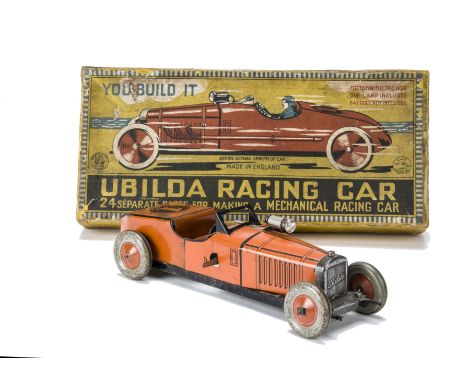 A Burnett Ubilda Racing Car,  orange lithographed tinplate with black lining, No1., clockwork and electric headlamp, in origi