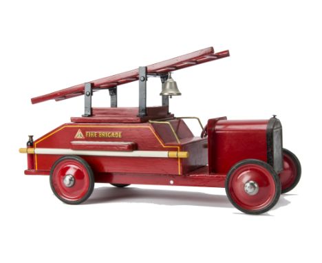 A Tri-ang wood and steel Fire Engine,  rebuilt with steel bonnet and chassis, red painted wooden back with yellow lining, tin