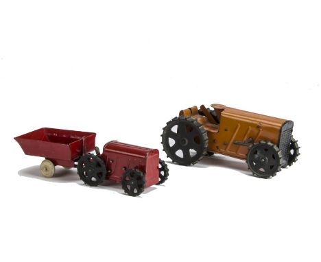 Tri-ang pressed steel clockwork Farm Tractors, a red No.1 Farm Tractor and Trailer --9½in. (24cm.) long; and an orange No.2 F