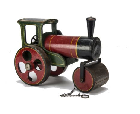 A Tri-ang Wooden pull-along Steam Roller,  painted red, black and green with yellow lining, tinplate tread to wheels, tinplat