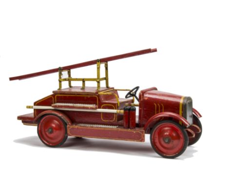A Triangtois Wooden Ford Fire Engine,  painted red with yellow lining, lithographed Ford tinplate radiator, hydrants, steel m