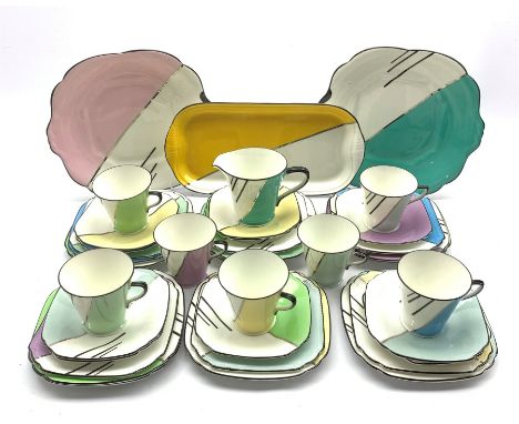  Art Deco Collingwood's Harlequin tea set comprising seven cups, ten saucers, six tea plates, ten side plates, two cake plate