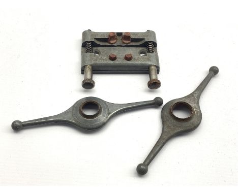  Two Rolex Oyster case back opening tools: 7 and 8 3/4, together with a matching watch clamp   - Condition Report 