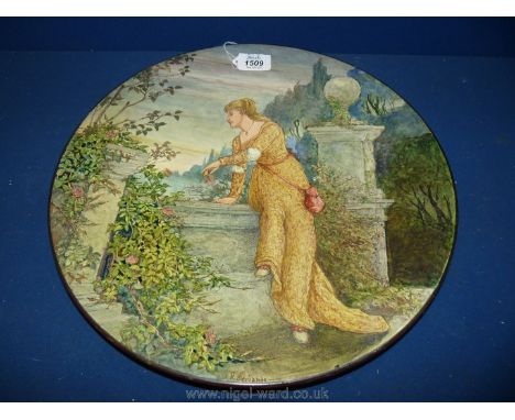 A late 19th c. art pottery circular Plaque, hand painted in pre-Raphaelite style with a young woman gazing over a wall and ho