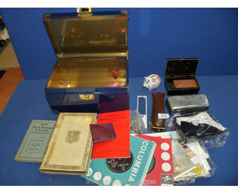 A quantity of miscellanea including 'Check Your Change' ready reckoner booklet, maths books, weather forecasting dial, wooden