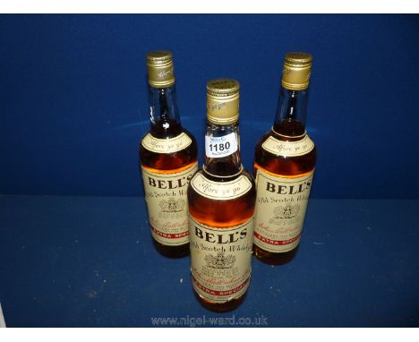 Three bottles of Bells Scotch Whisky.