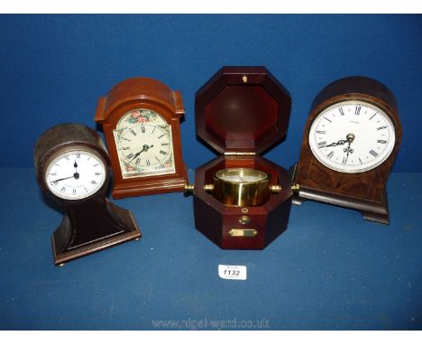 An octagonal brass Ship's Clock, three battery operated mantle clocks including Metamec and Comitti of London, some a/f.