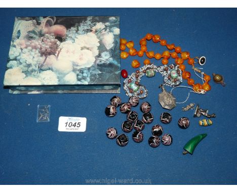 Miscellaneous vintage beads, silver charm and opal miner charm.