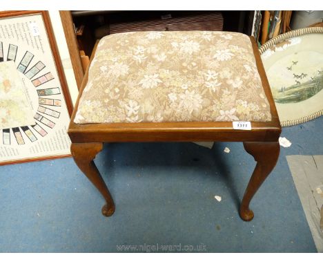 A tapestry topped Piano Stool, 17'' tall x 19'' wide.