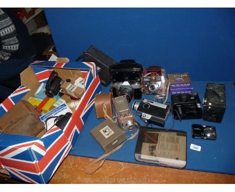 A quantity of cameras including Samsung Camcorder, Canon Fujifilm, Pentacon Camera in original case, 'May Fair' Kodak Brownie