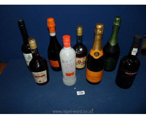 A box of sparking wine, ports and spirits including Veuve Clicquot, Prosecco, Peach Schnapps, Honey Brandy, Apricot Brandy, C