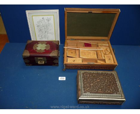 Three wooden oriental boxes, a/f, one with profusely decorated interior panels, another with jade like flower to centre top