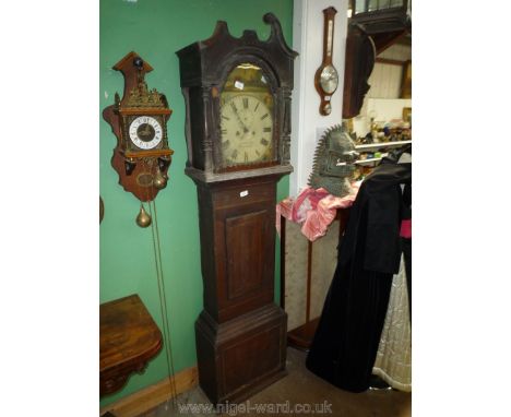A Mahogany cased light and darkwood strung Longcase Clock, the eight day movement by ''Simmons, Aberdare'' having a painted f