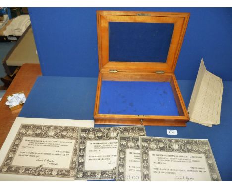 A lightwood Document Box, 11'' deep x 13 1/2'' wide x 3 1/2'' tall, with key in bombe form with brass inlay and 1939 share ce