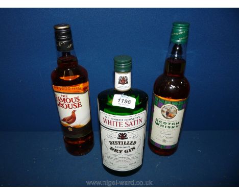 A bottle of White Satin London Gin, Famous Grouse Scotch Whisky and one other.