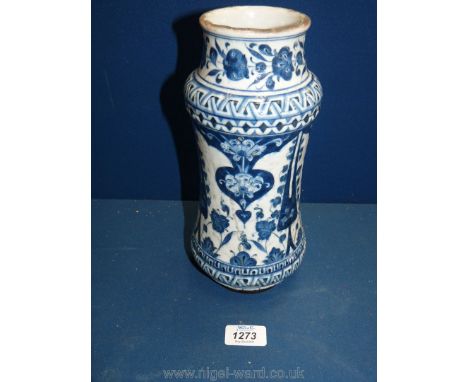 An antique Iznik blue and white fritware albarello, possibly circa 1520, decorated in cobalt with saz leaves and stylized car