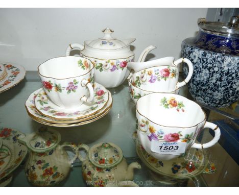 A quantity of  Royal Crown Derby teaware including two cups and saucers, teapot, sugar bowl and cream jug and sweet dish.