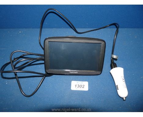 A TomTom Via 52 Sat Nav with cigar lighter power cable and windscreen mount.