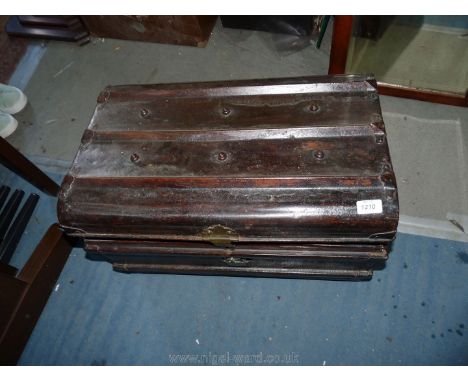 A trunk with a metal domed top, two handles and a light blue painted inner, 24" wide x 16" deep x 15" tall.