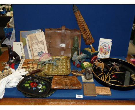 An Escargot Snail with six pins, stationery case, cigarette lighter, paper parasol, resin figure of a dog, cream ladies eveni
